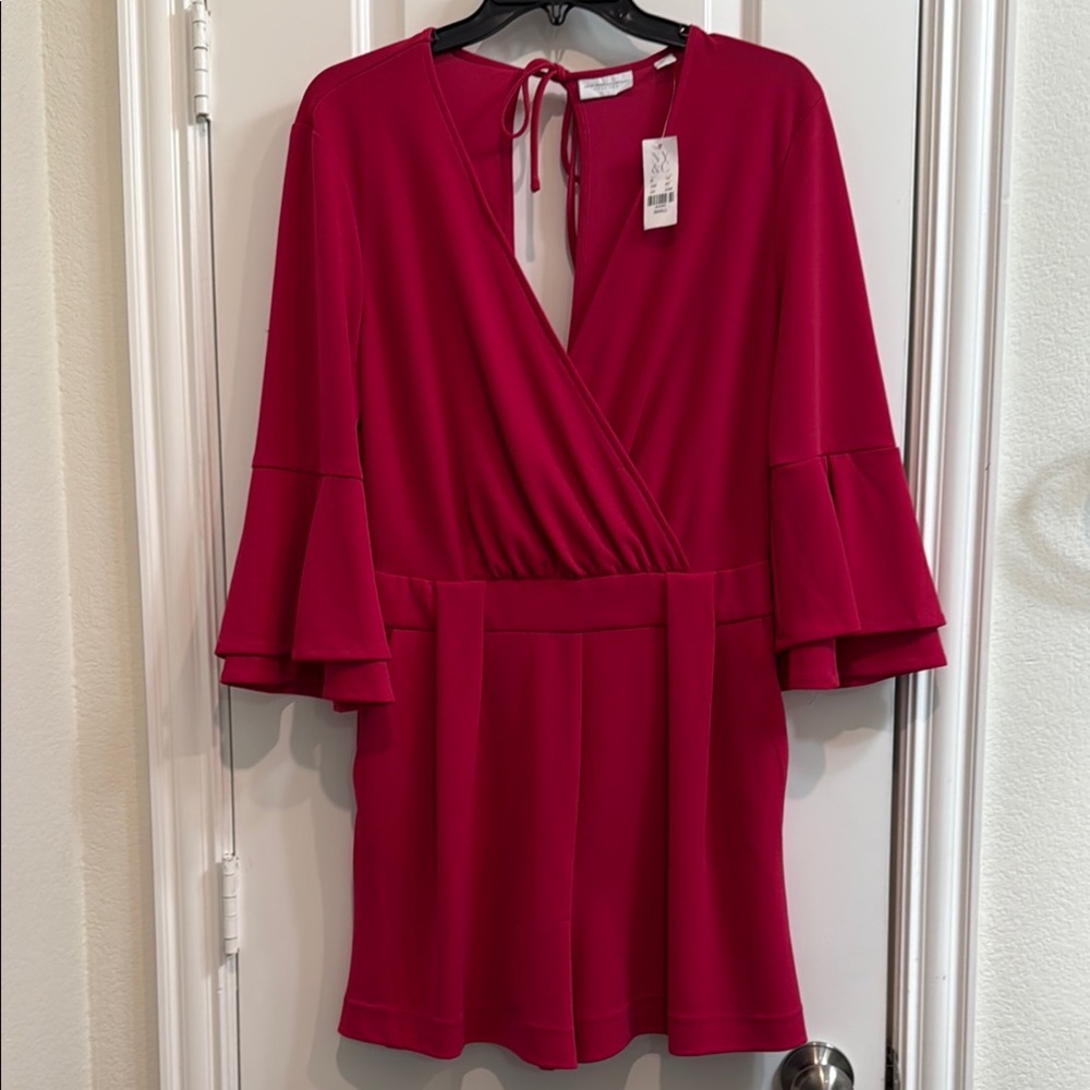 Elegant Pink Romper with Flared Sleeves SMALL